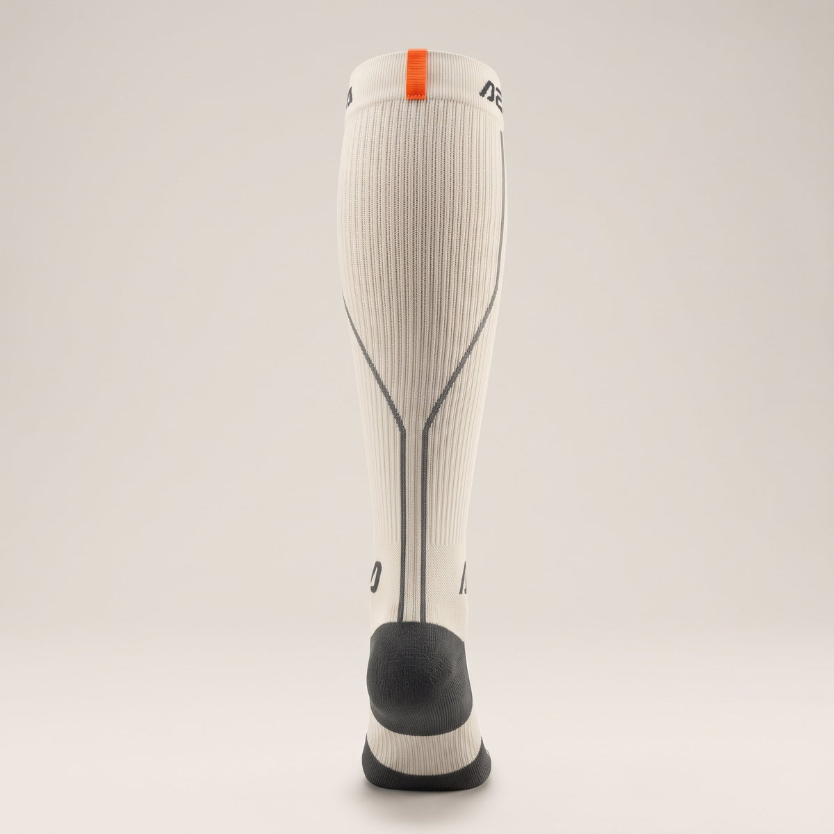 AERA Off White Ember compression running sock – back