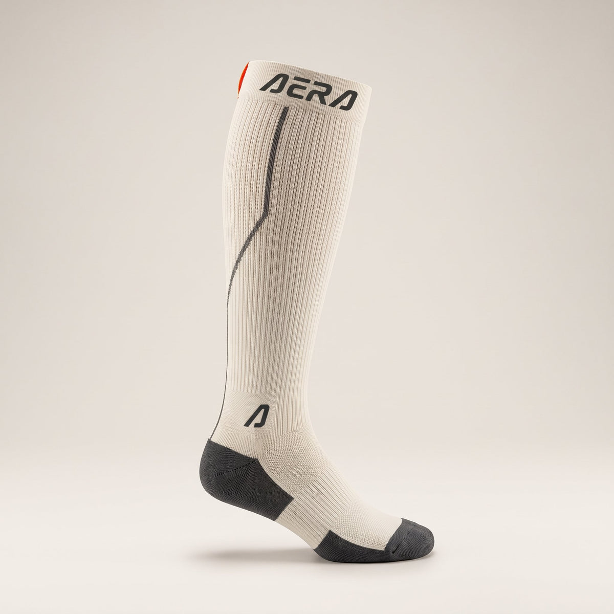 AERA Off White Ember compression running sock – side